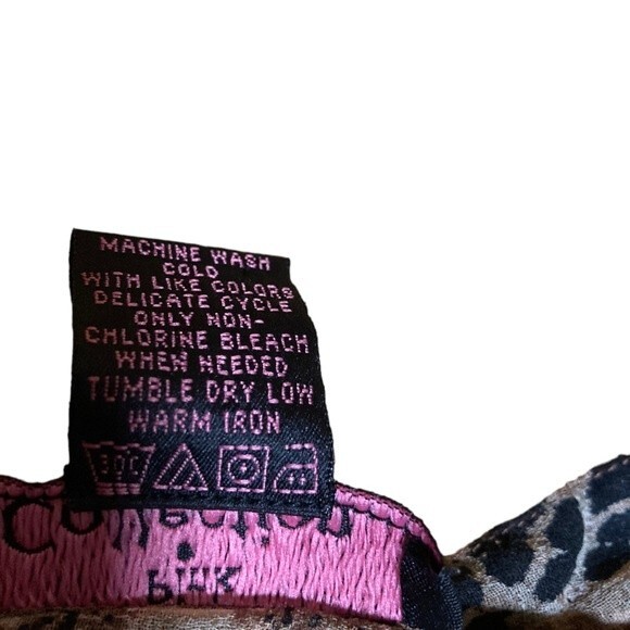 Pink Collection women’s leopard print ruffled blouse with 1/4 butterfly sleeves. - Picture 6 of 8